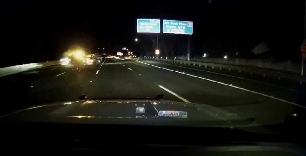 Outrageous moment sleeping Tesla driver gets rude awakening as he crashes into California patrol car