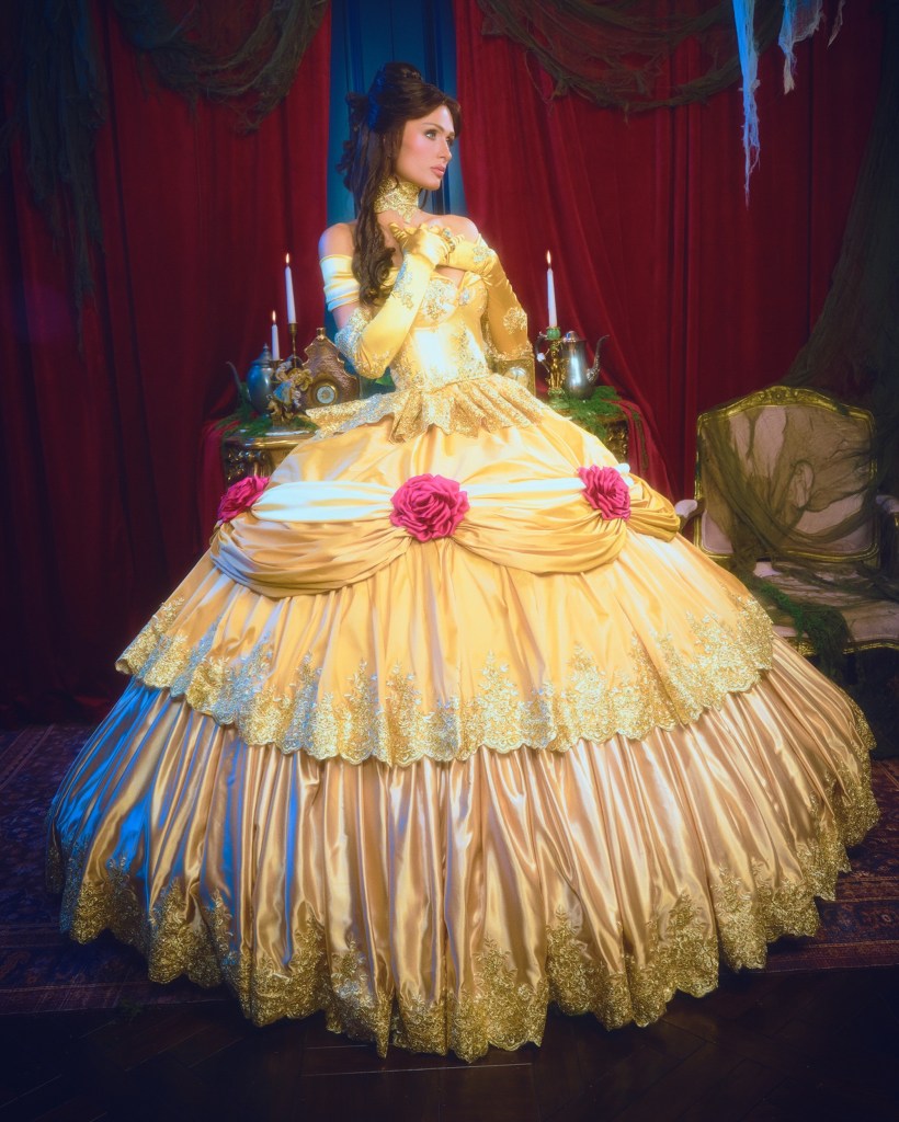 Paris Hilton gets the princess treatment in family Halloween shoot with her husband and kids