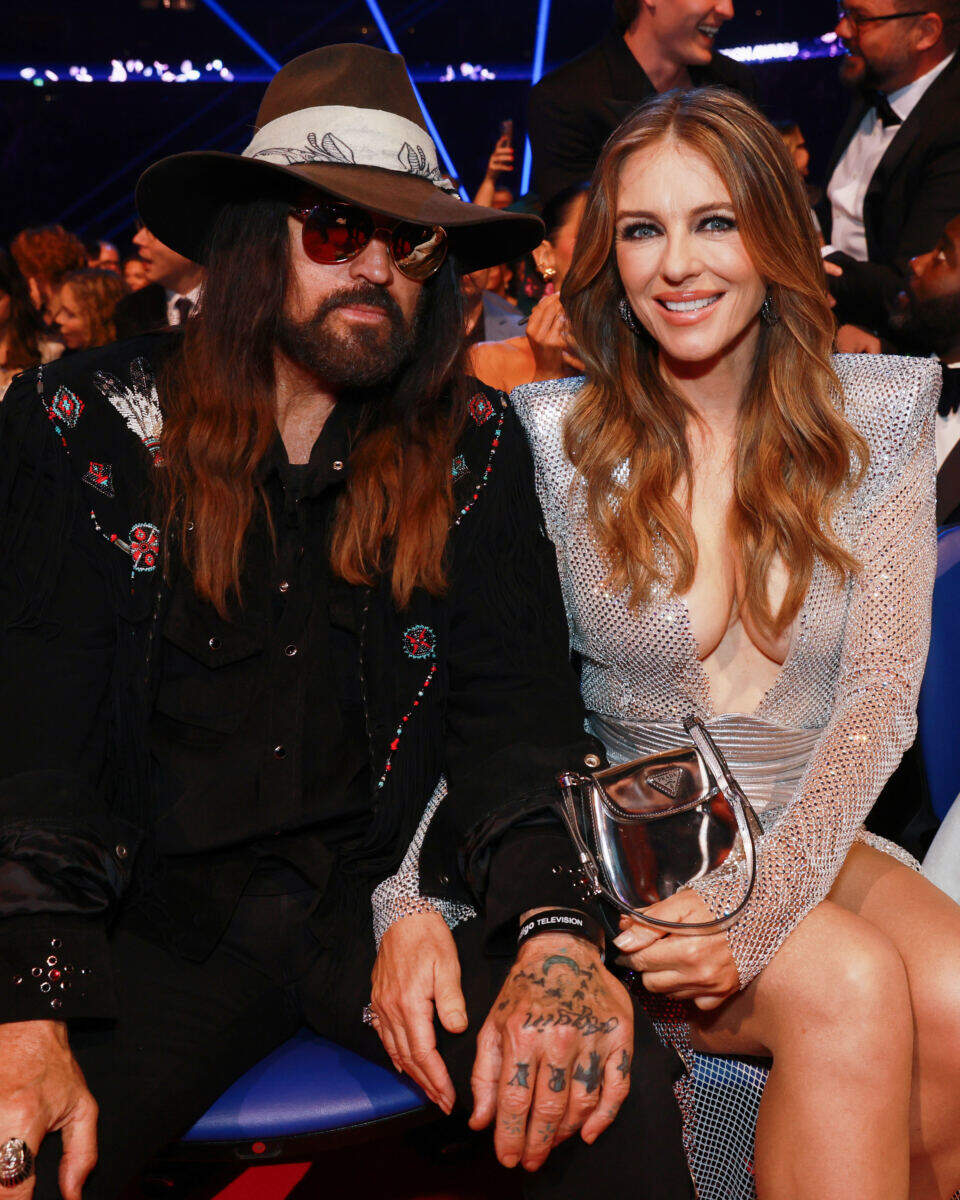 Elizabeth Hurley and Billy Ray Cyrus take major step in their romance