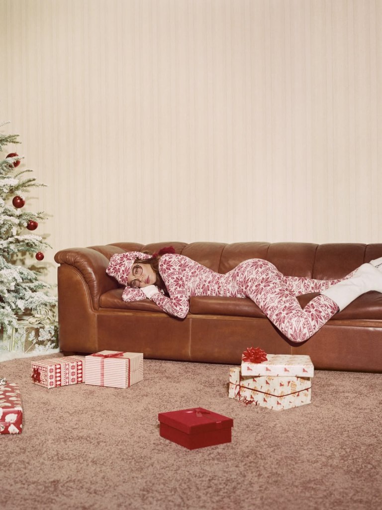 The Kardashian-Jenner sisters cozy up to Santa in Skims’ retro holiday campaign