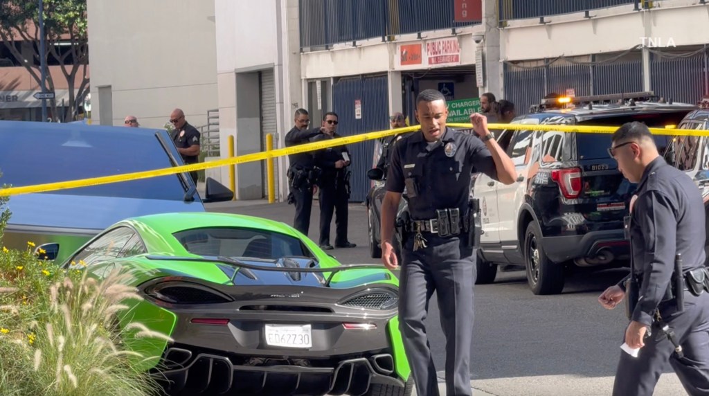 Wild gunfight erupts in LA as shooters fire hail of bullets into tourist’s McLaren supercar