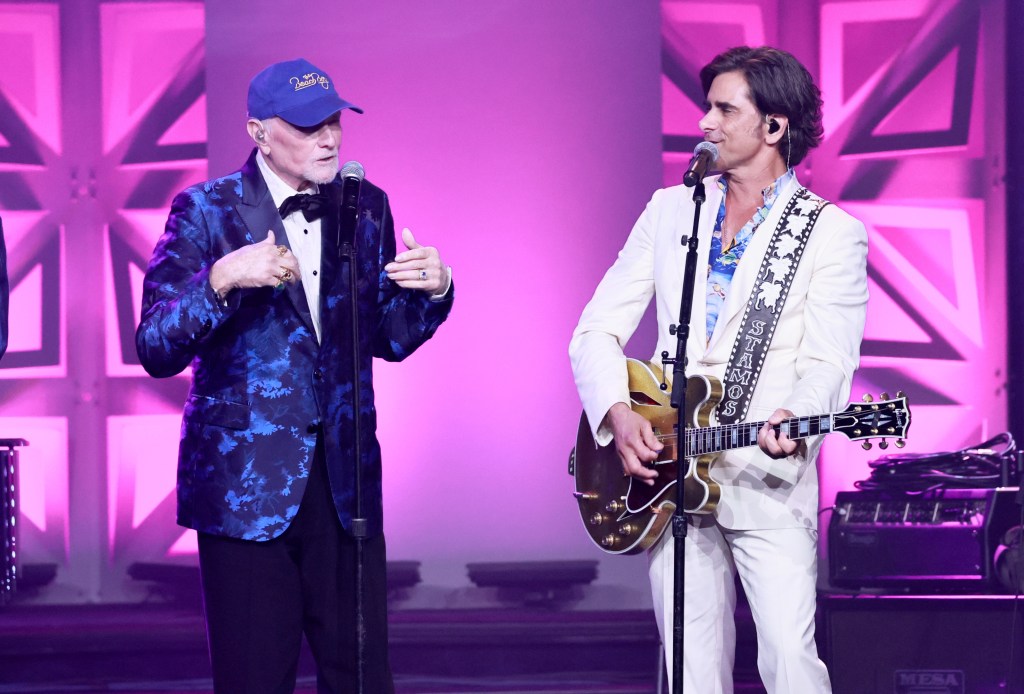 Footage of Beach Boys’ Mike Love sitting during performance goes viral as he battles ‘serious’ health challenges