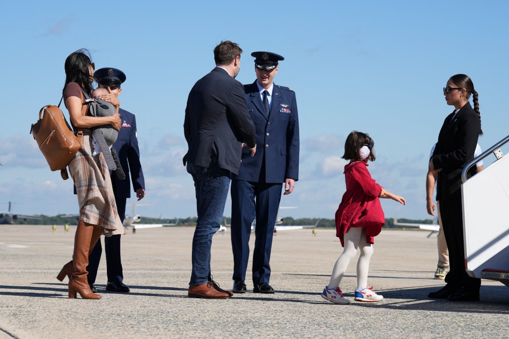 Usha Vance stumbles down vice presidential helicopter steps with infant son strapped to her chest: video