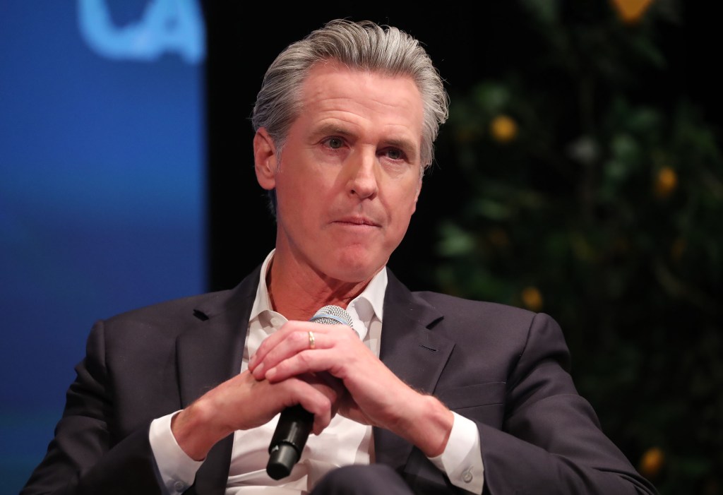 Gavin Newsom and Arnold Swartzenegger congratulate each other for California’s hated environmental regulations