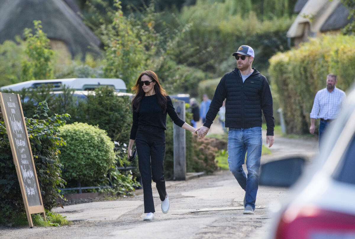 Prince Harry and Meghan Markle hold hands on romantic pub date in first photos together since UK return