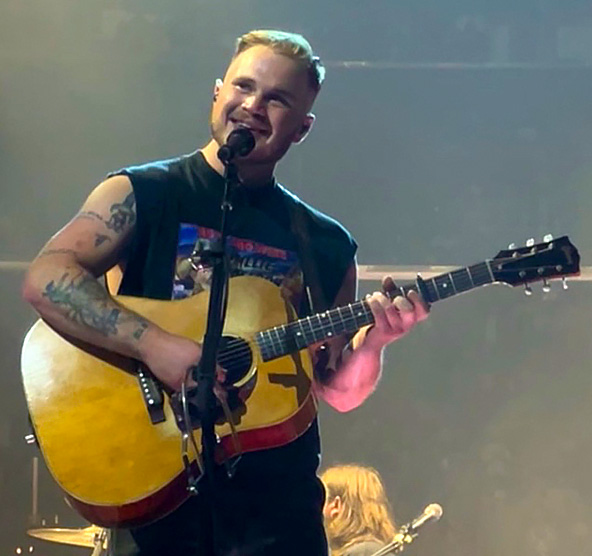 Zach Bryan performs at Robert Kraft's stadium wearing 'Free Palestine' after Ed Sheeran tour drama
