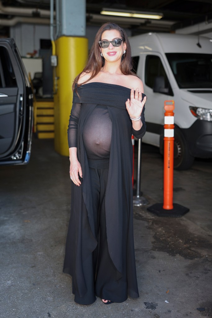 Anne Hathaway’s latest maternity look has a built-in window for her baby bump