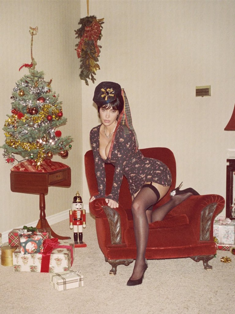 The Kardashian-Jenner sisters cozy up to Santa in Skims’ retro holiday campaign