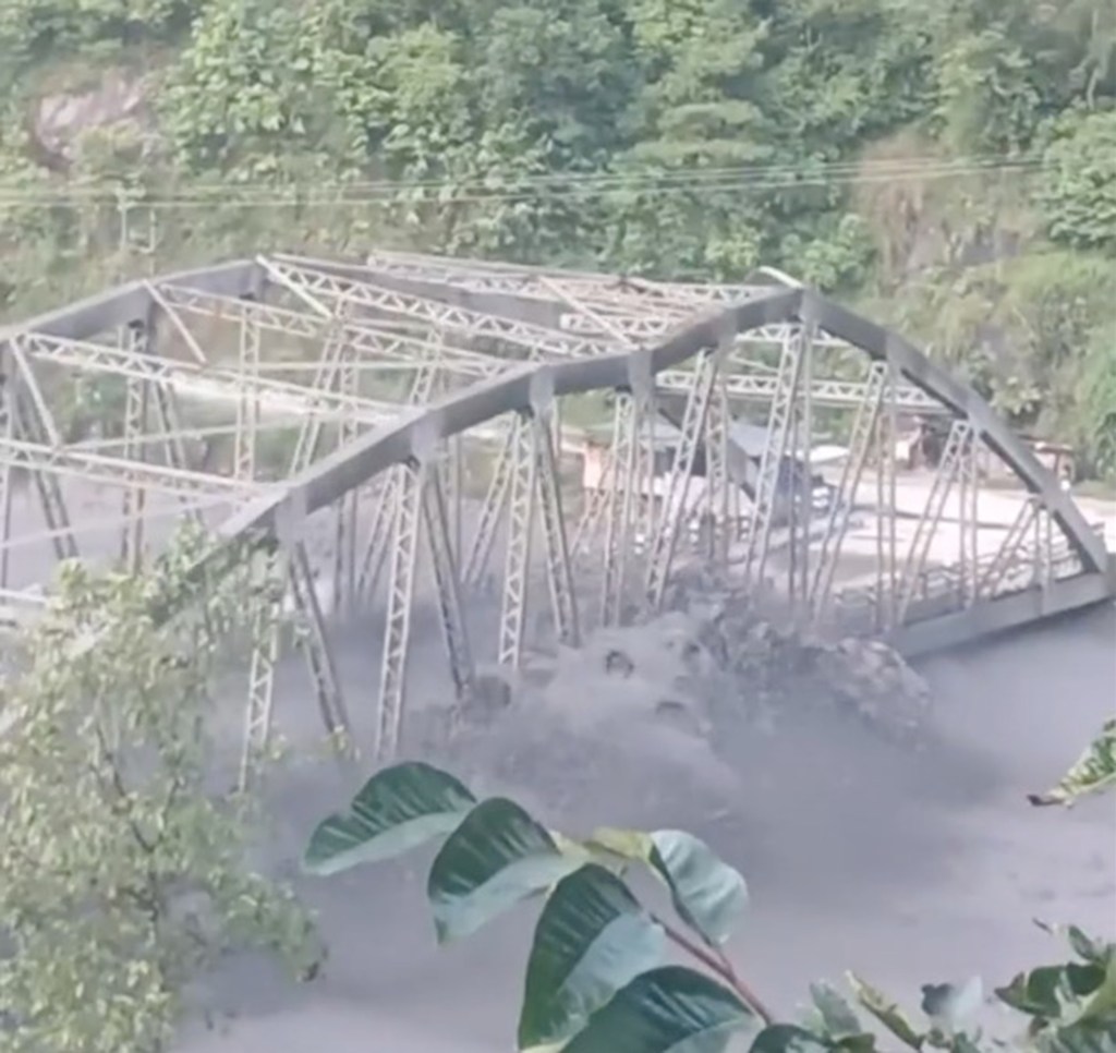 Roaring flash floods wipe out entire bridge in Nepal in dramatic video
