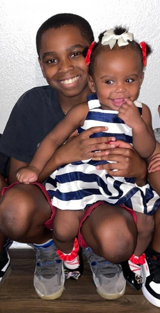 ‘Hero’ 13-year-old killed shielding younger sister from shooting