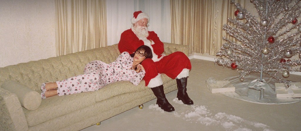 The Kardashian-Jenner sisters cozy up to Santa in Skims’ retro holiday campaign