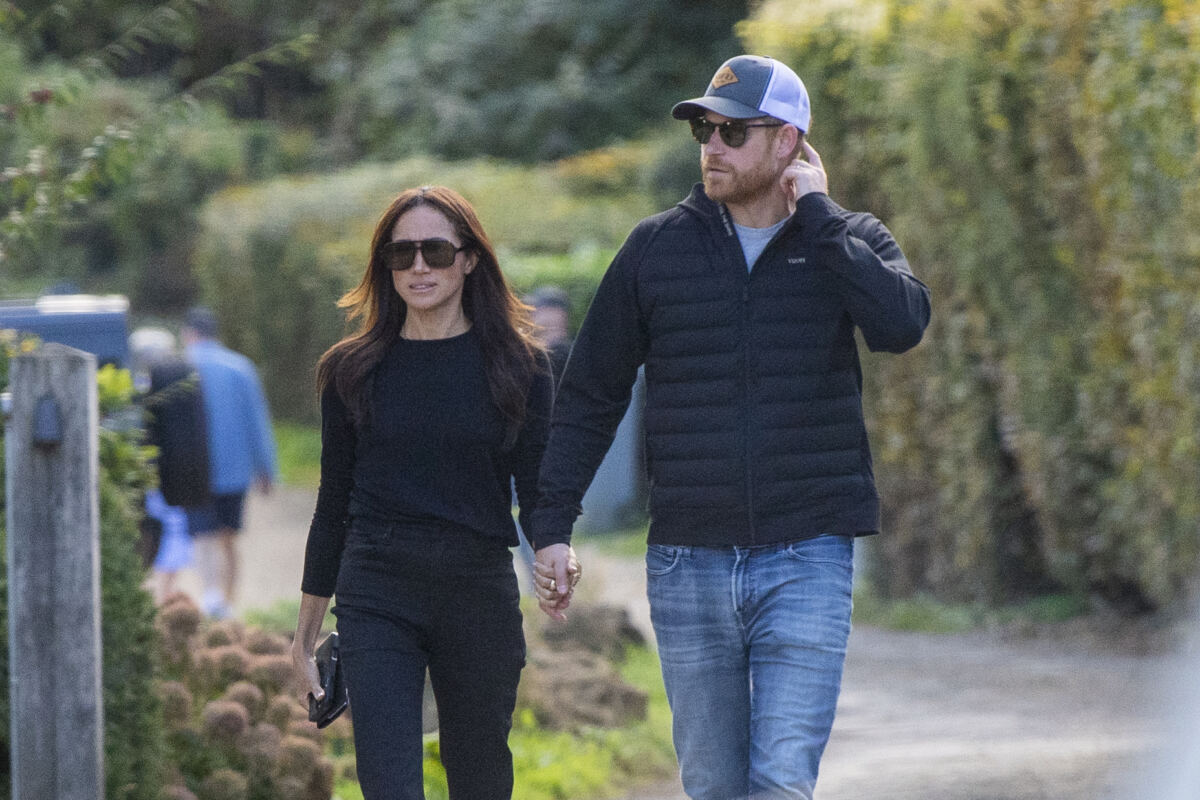 Prince Harry and Meghan Markle hold hands on romantic pub date in first photos together since UK return