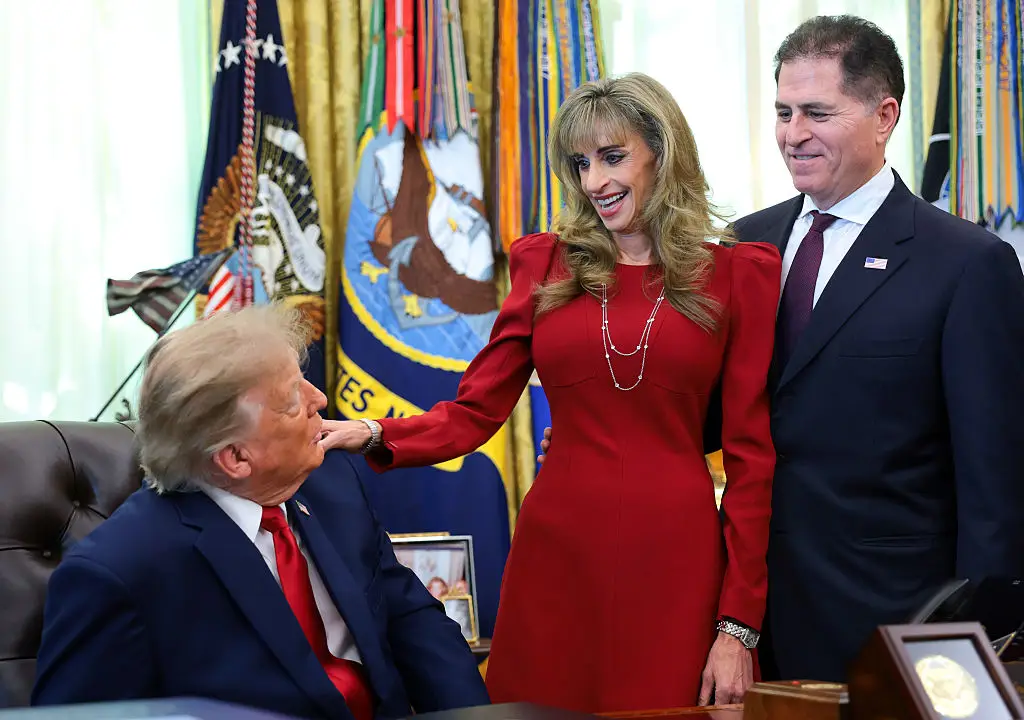 Who is the woman standing with Trump in 'weird' White House clip dubbed 'not real'