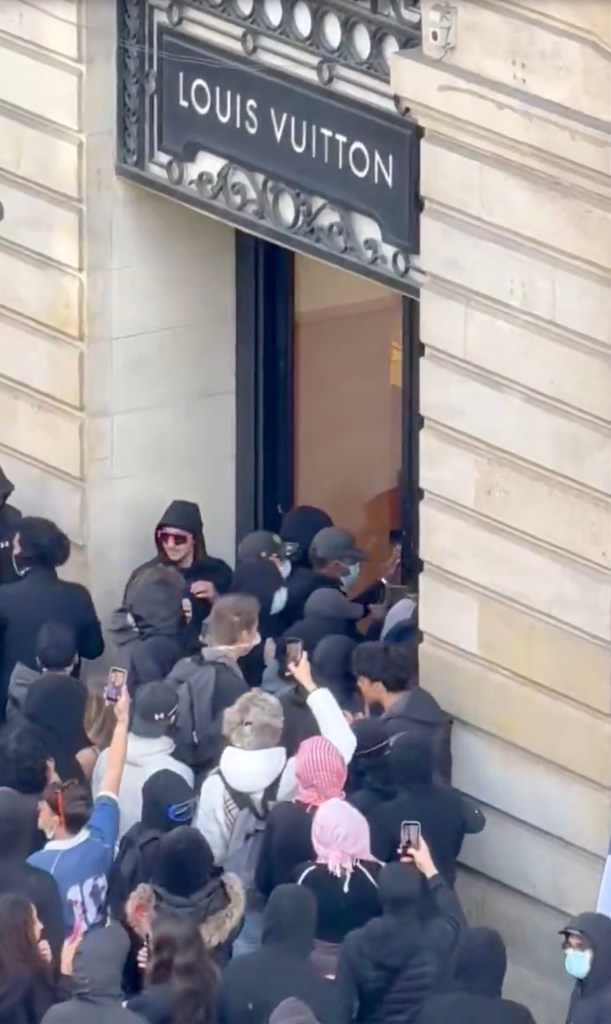 French rioters target Louis Vuitton, Hermes and Apple stores — as lux brands hire their own guards