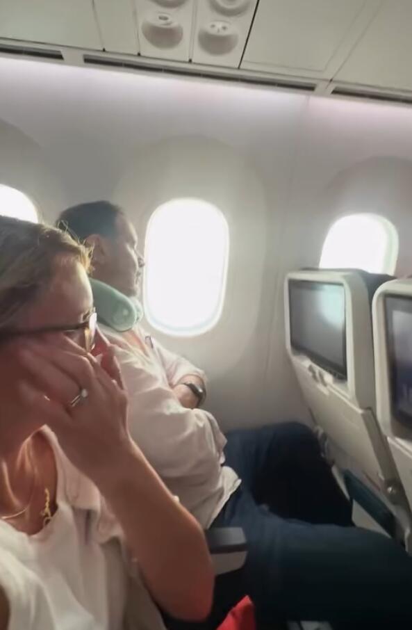 Airline passenger in tears after seatmate refused to switch so she could be near husband