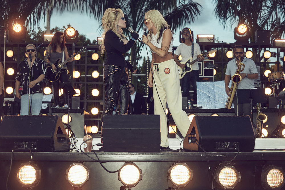 Miley Cyrus cries while honoring late godmother Dolly Parton at LA concert: ‘I miss her’
