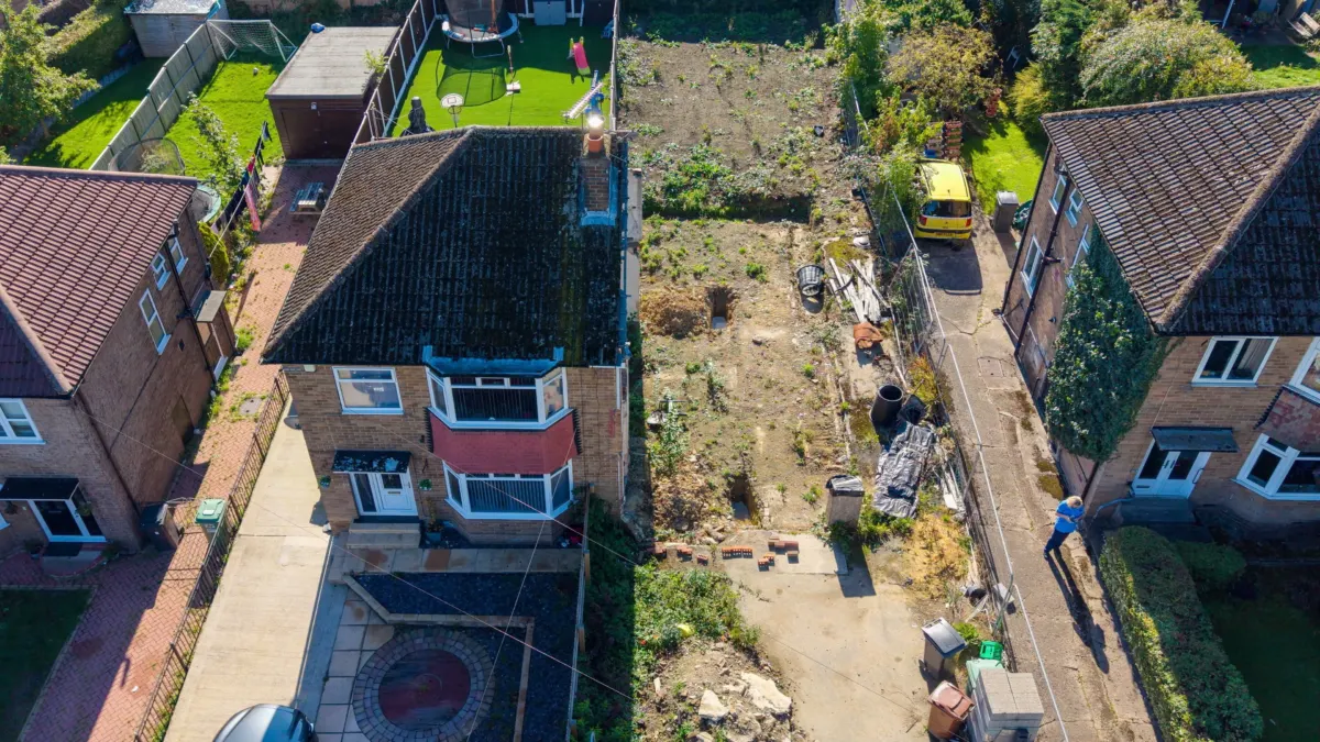 Woman fuming after neighbour illegally demolishes the other half of her semi-detached house