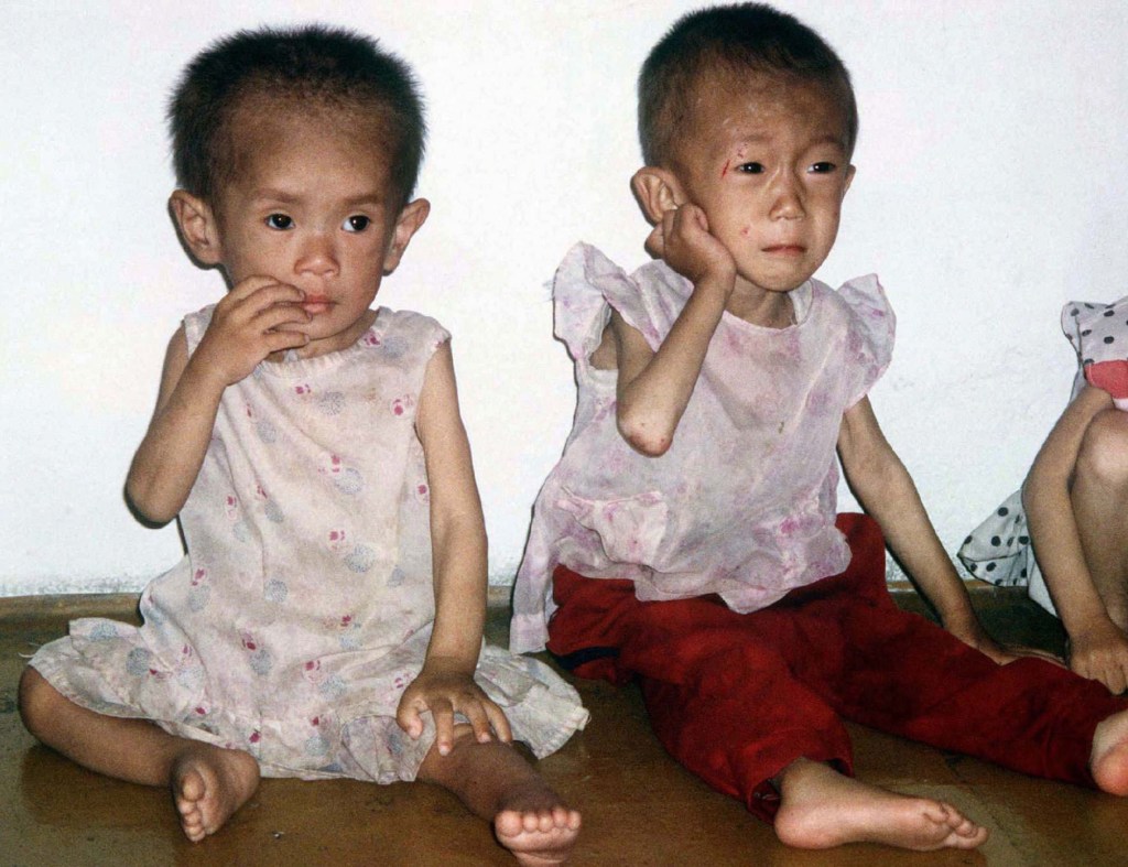 Never-before-seen images from inside North Korea reveal haunting devastation of 90s famine