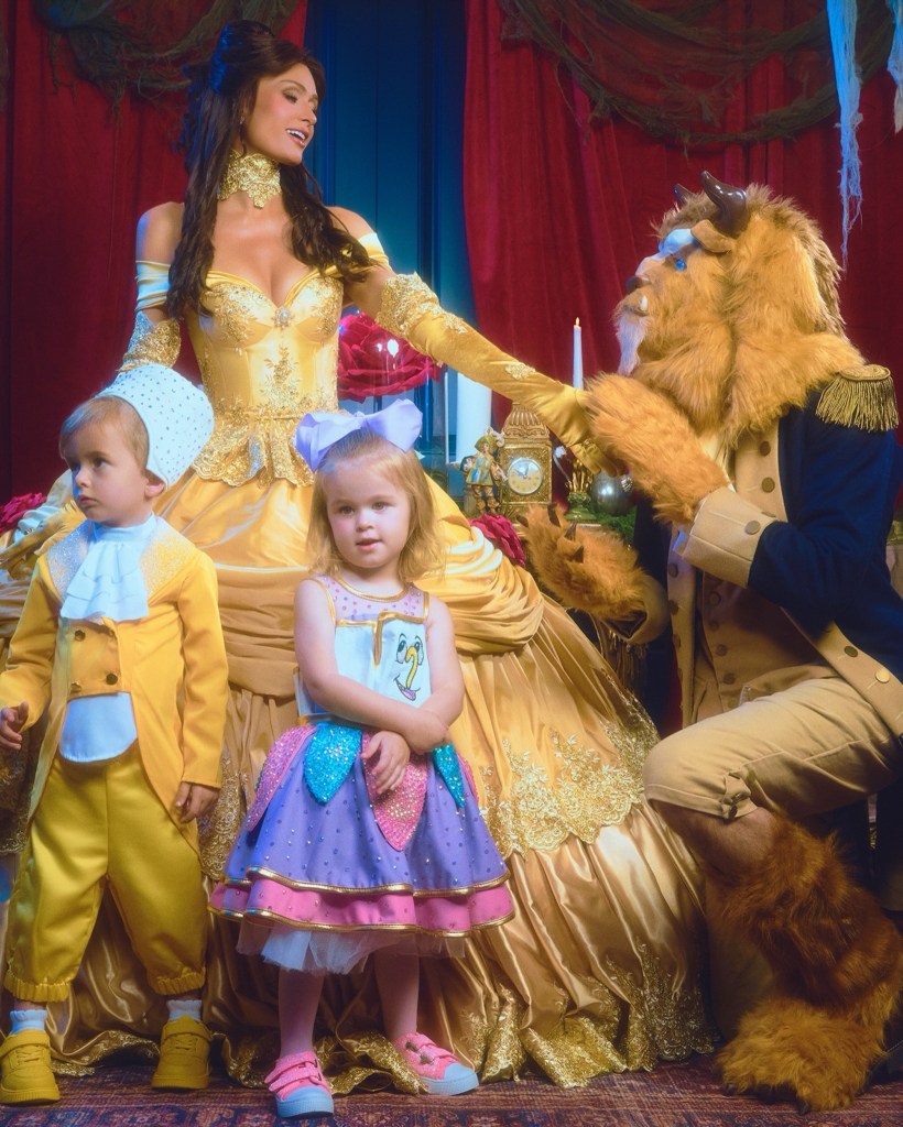 Paris Hilton gets the princess treatment in family Halloween shoot with her husband and kids