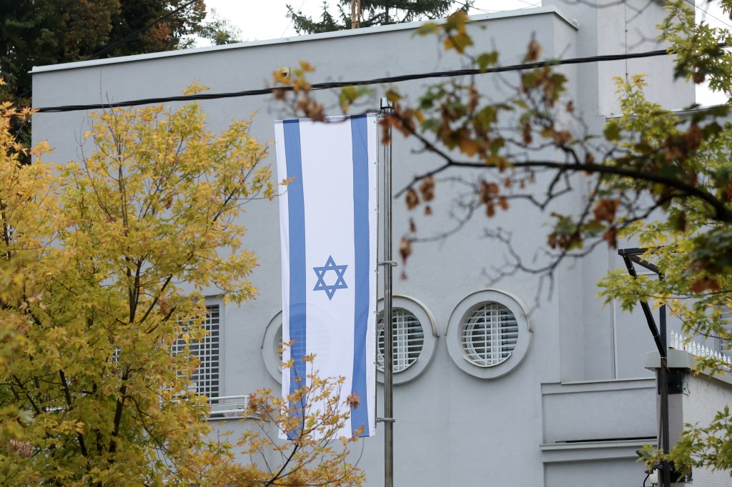 ISIS-supporting minor attacks cop guarding Israeli Embassy in Belgrade with knives – before being fatally shot: report