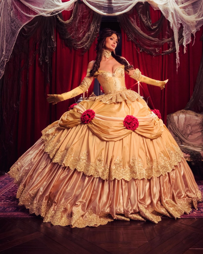 Paris Hilton gets the princess treatment in family Halloween shoot with her husband and kids