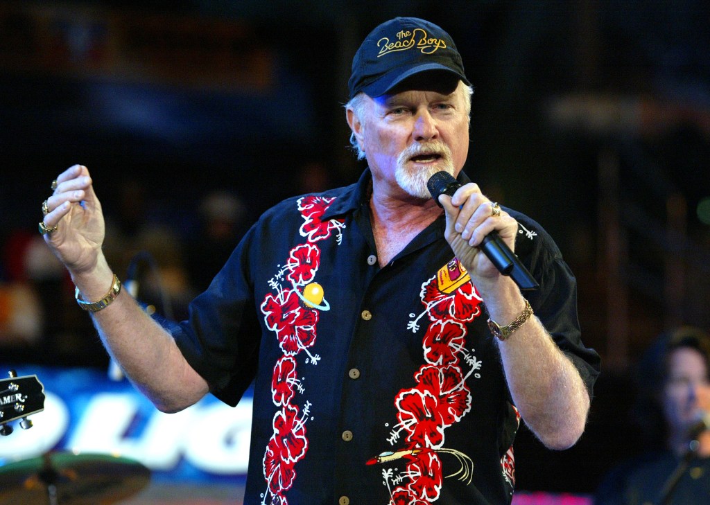Footage of Beach Boys’ Mike Love sitting during performance goes viral as he battles ‘serious’ health challenges