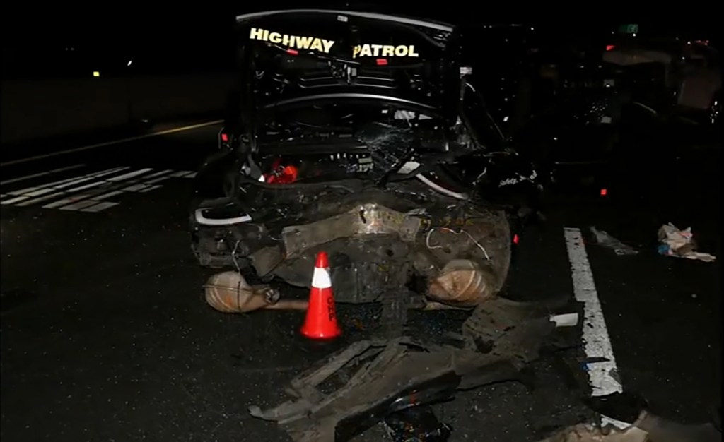 Outrageous moment sleeping Tesla driver gets rude awakening as he crashes into California patrol car
