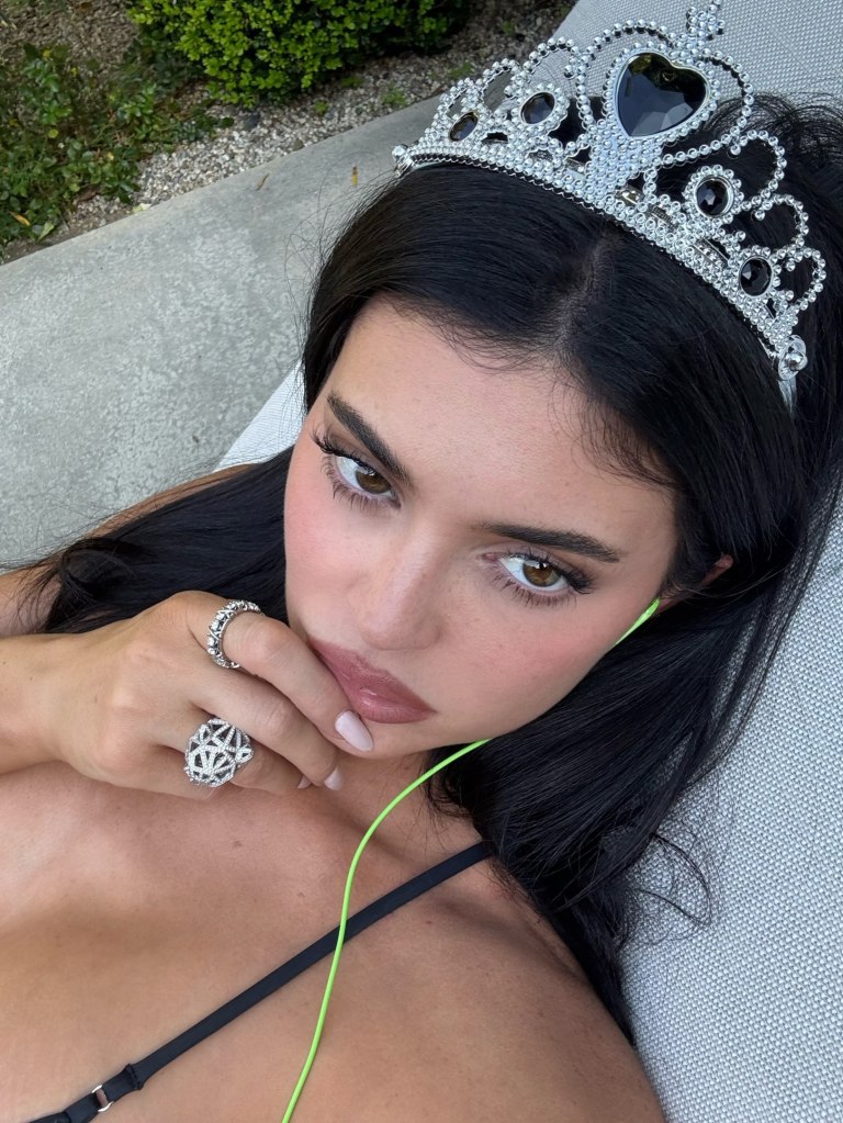 Hole-y moly: Kylie Jenner wears nothing but a fishnet stocking dress for magazine cover