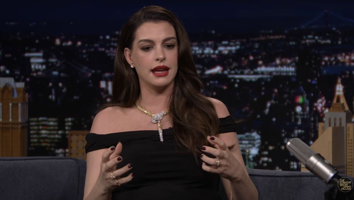 Anne Hathaway apologizes for ‘horrifying’ red carpet moment when she ordered photographers around in ‘mom mode’