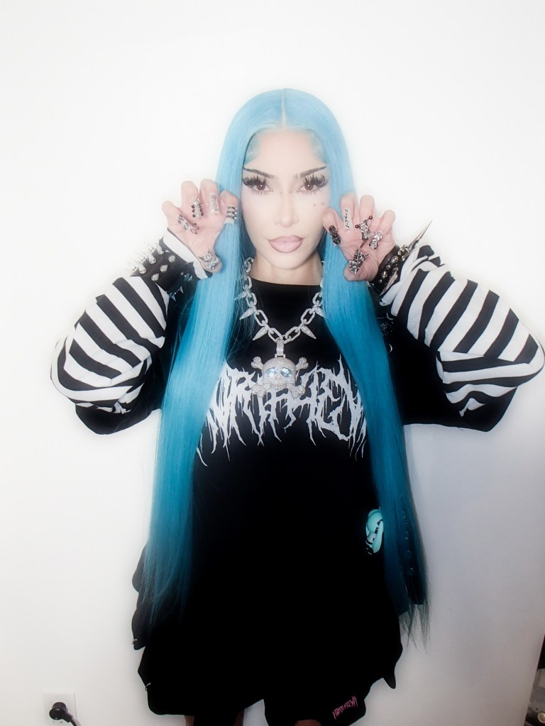 Kim Kardashian transforms into 13-year-old daughter North West for Halloween — including blue hair and piercings