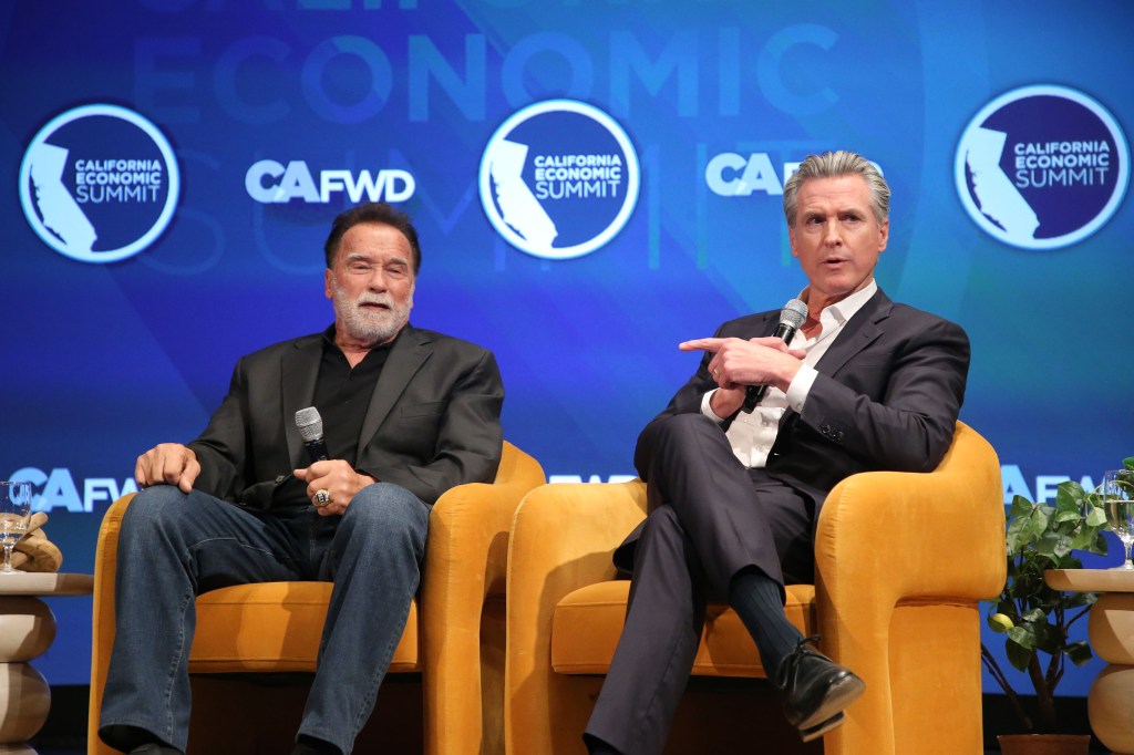 Gavin Newsom and Arnold Swartzenegger congratulate each other for California’s hated environmental regulations