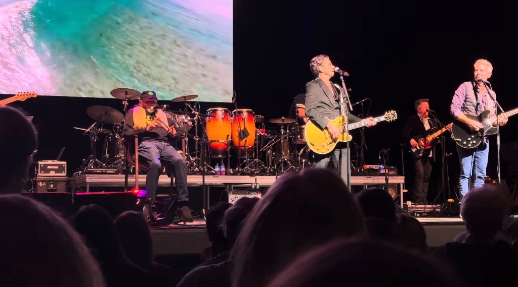 Footage of Beach Boys’ Mike Love sitting during performance goes viral as he battles ‘serious’ health challenges