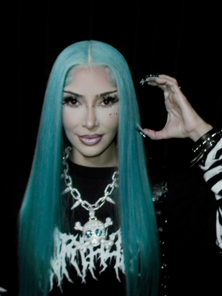 Kim Kardashian transforms into 13-year-old daughter North West for Halloween — including blue hair and piercings