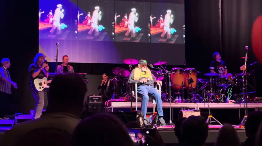 Footage of Beach Boys’ Mike Love sitting during performance goes viral as he battles ‘serious’ health challenges
