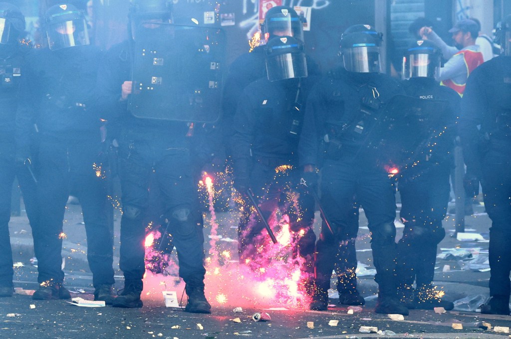 One-year-old baby struck by fireworks in violent student protests raging across France