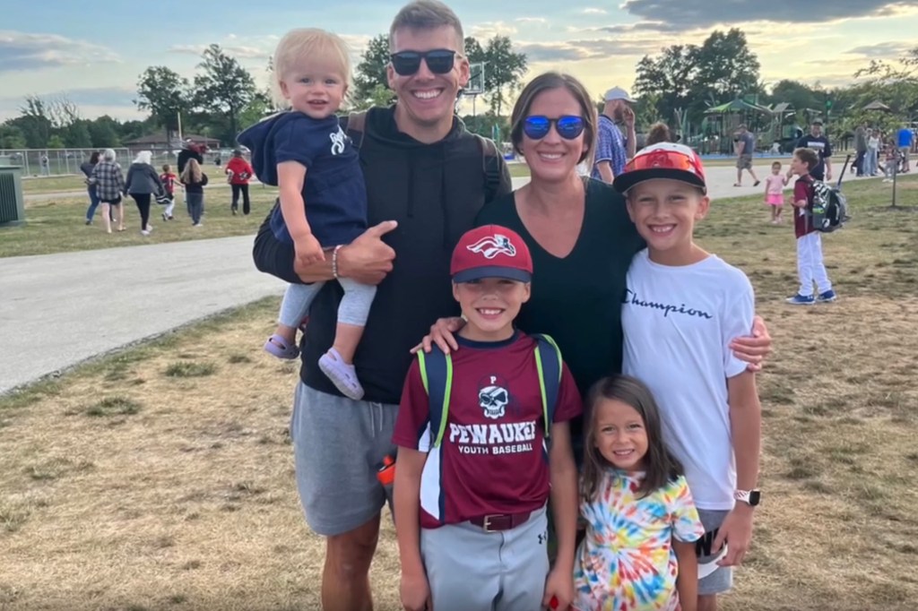 Wisconsin father of four dies after collapsing near finish line while running in his first half marathon