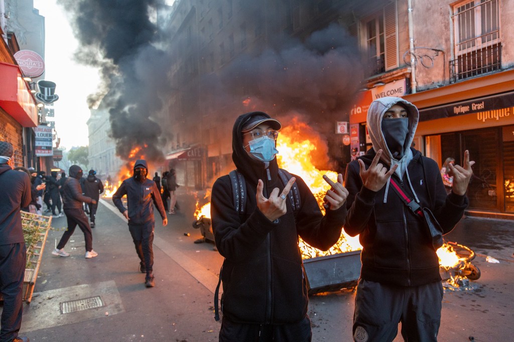 US radicals headed to France to join cop-bashing protests are planning to bring riots to our shores