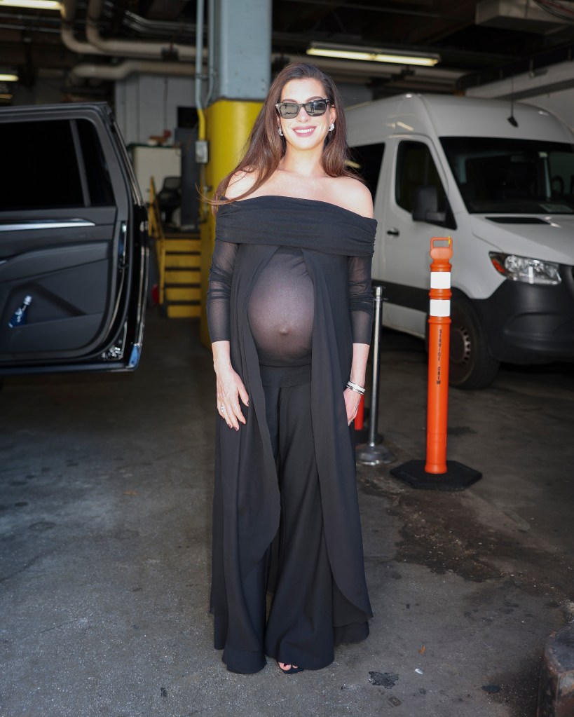 Anne Hathaway’s latest maternity look has a built-in window for her baby bump