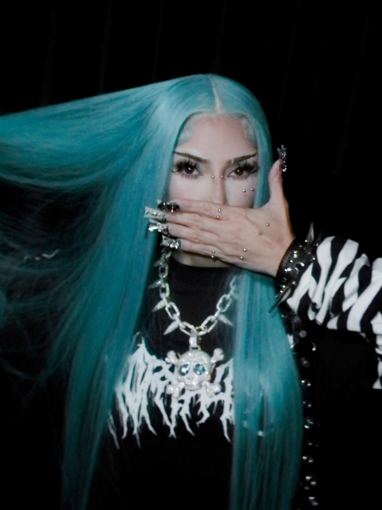 Kim Kardashian transforms into 13-year-old daughter North West for Halloween — including blue hair and piercings