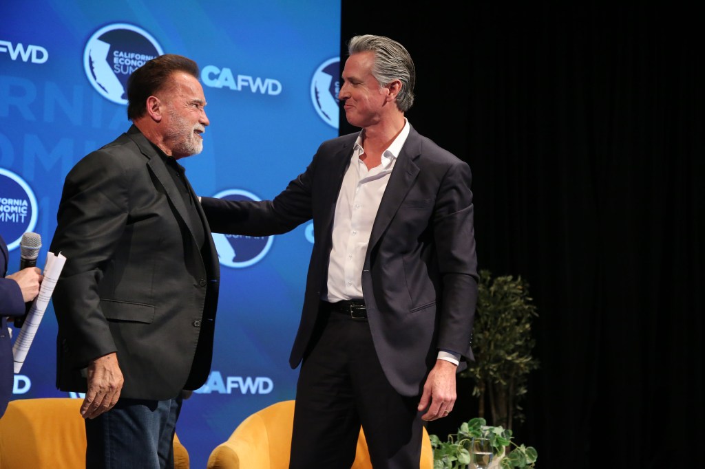 Gavin Newsom and Arnold Swartzenegger congratulate each other for California’s hated environmental regulations