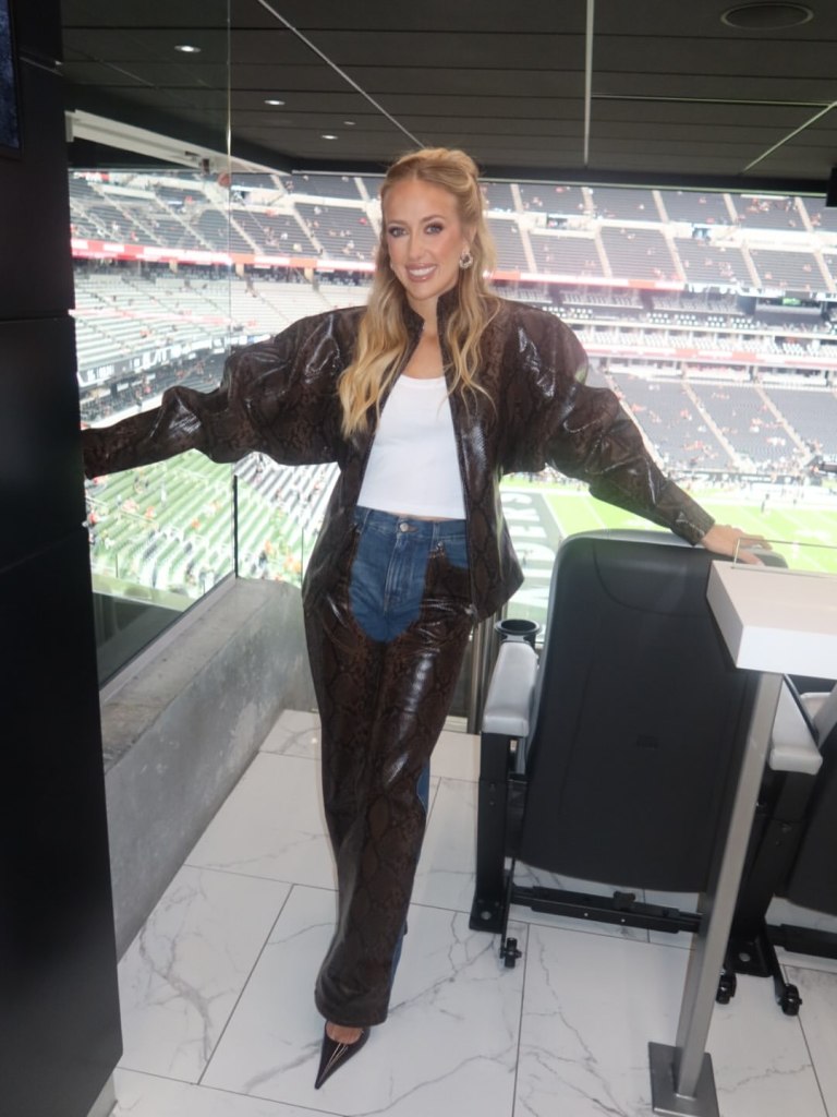 Brittany Mahomes cheers on the Chiefs in snakeskin chaps