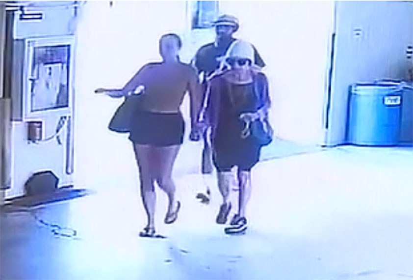 Terrifying moment towering thug allegedly kidnaps screaming woman in front of friend at popular resort