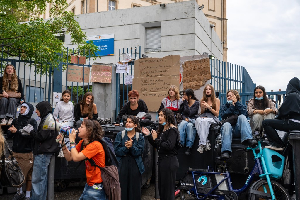 Boy, 15, arrested after being caught on video blasting fire in woman’s face during France’s student riots