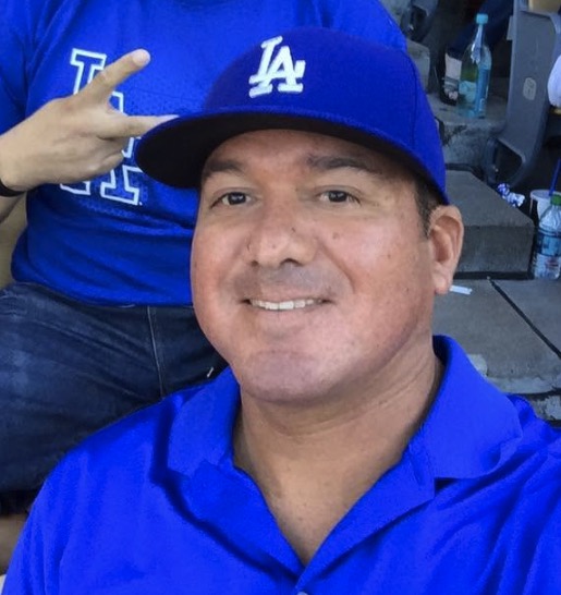 Horror as California high school football staffer collapses and dies on sideline during varsity game