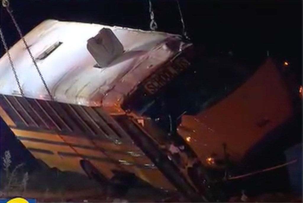25 hurt when elderly driver of Ga. High school football bus loses control and flipps over