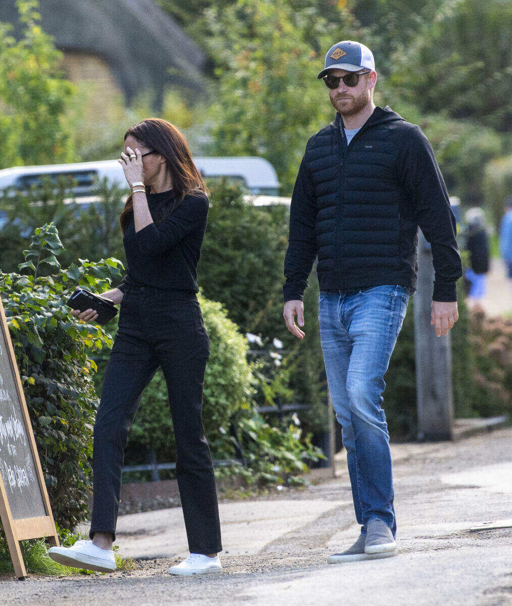 Prince Harry and Meghan Markle hold hands on romantic pub date in first photos together since UK return