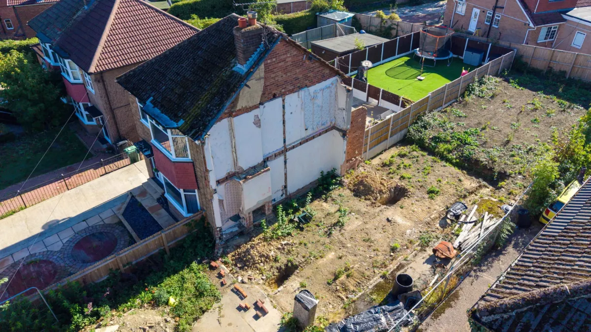 Woman fuming after neighbour illegally demolishes the other half of her semi-detached house