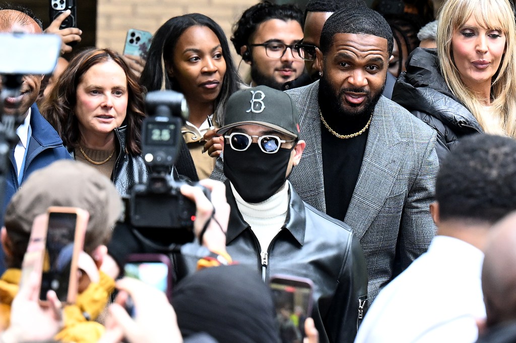 See Chris Brown repeatedly bash producer over head with bottle in London club — as he avoids jail time