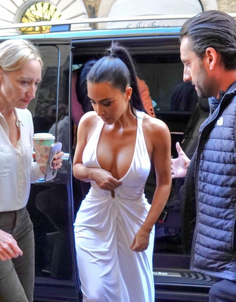 Kim Kardashian wows in plunging white gown while shopping in Rome