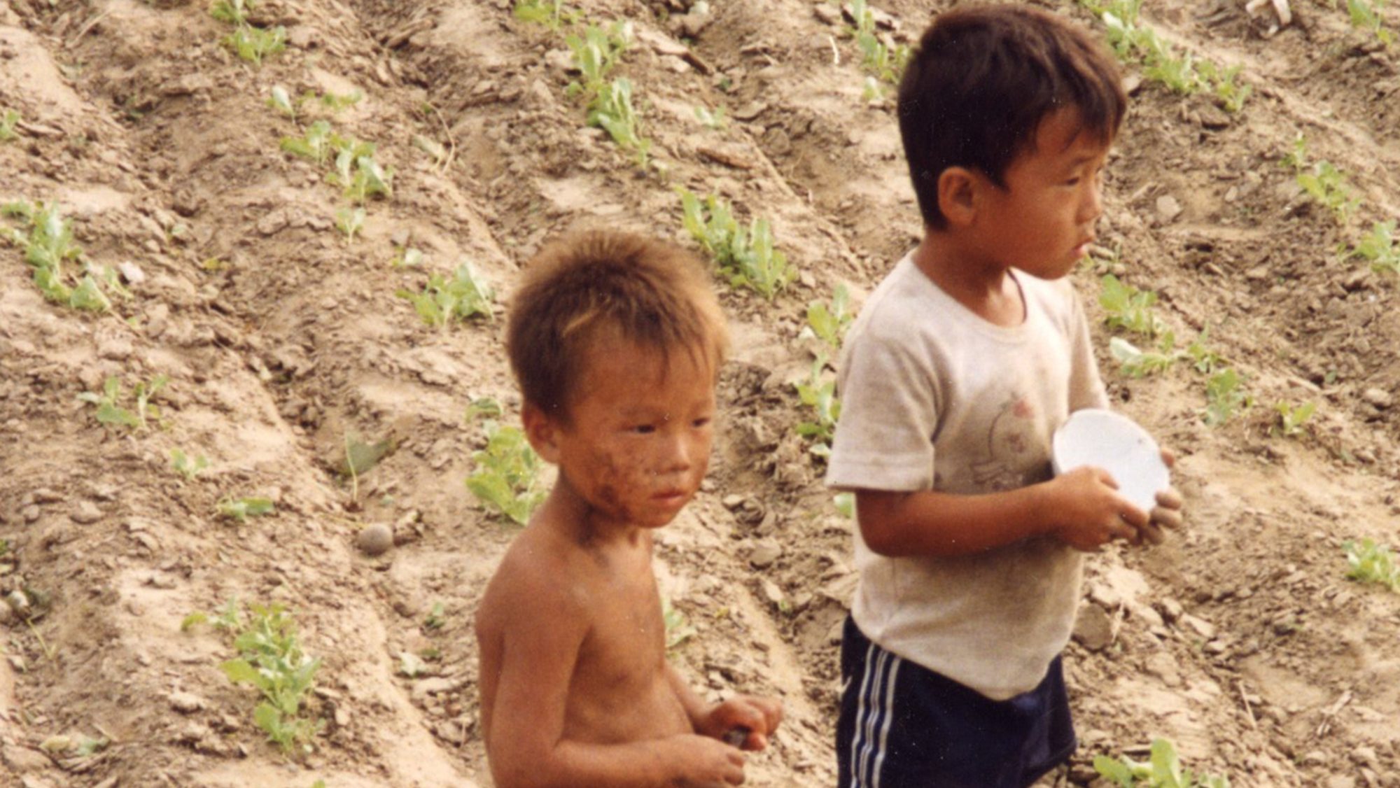 Never-before-seen images from inside North Korea reveal haunting devastation of 90s famine